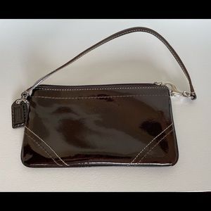 Authentic Coach wristlet, patent leather, minimally used, great condition!